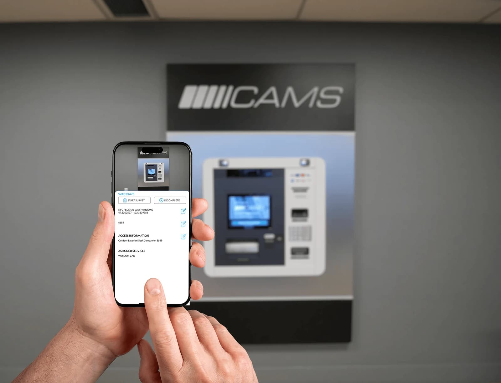 CAMS published product photo showing a mobile survey in use at an ATM.