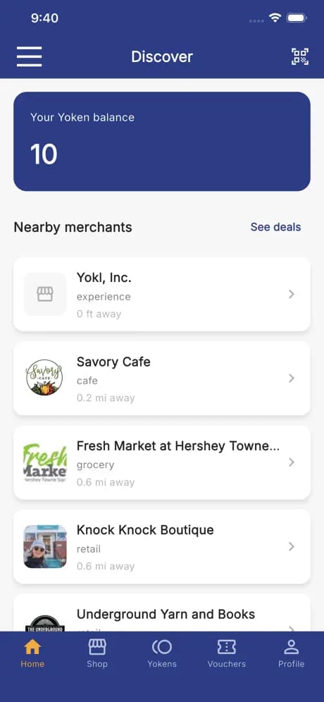 Yokl Discover screen showing a Yoken balance and a list of nearby merchants with distances.